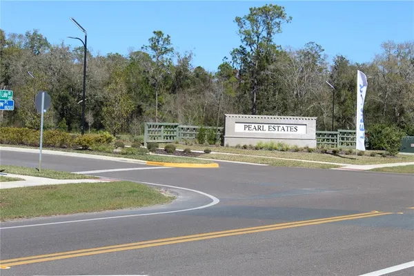 a view of a lake with a big yard