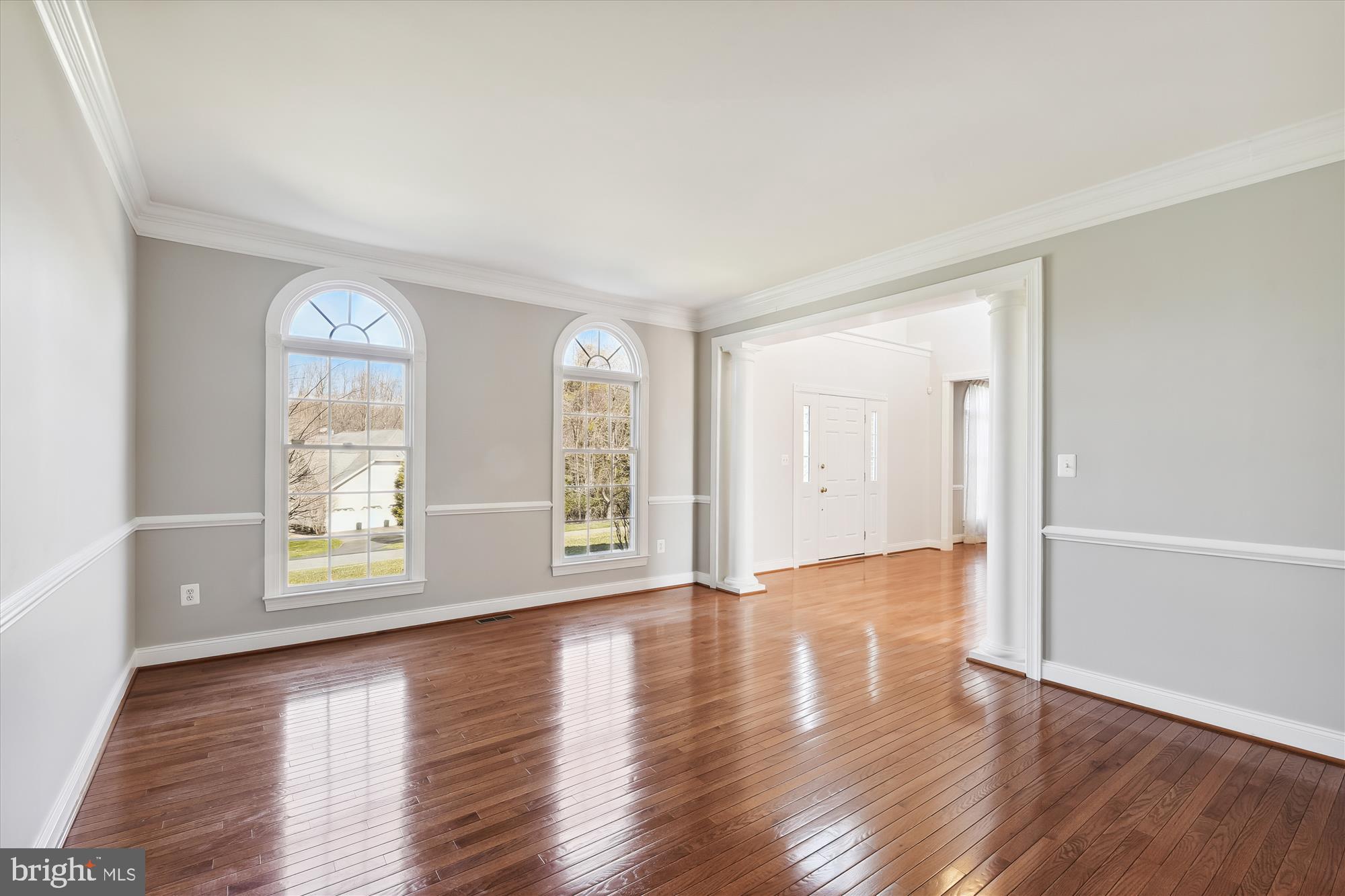 109 Hunts Bluff Road Sparks Glencoe, MD 21152 - Photo 8 of 71 Living Room with chair rail & Palladian windows