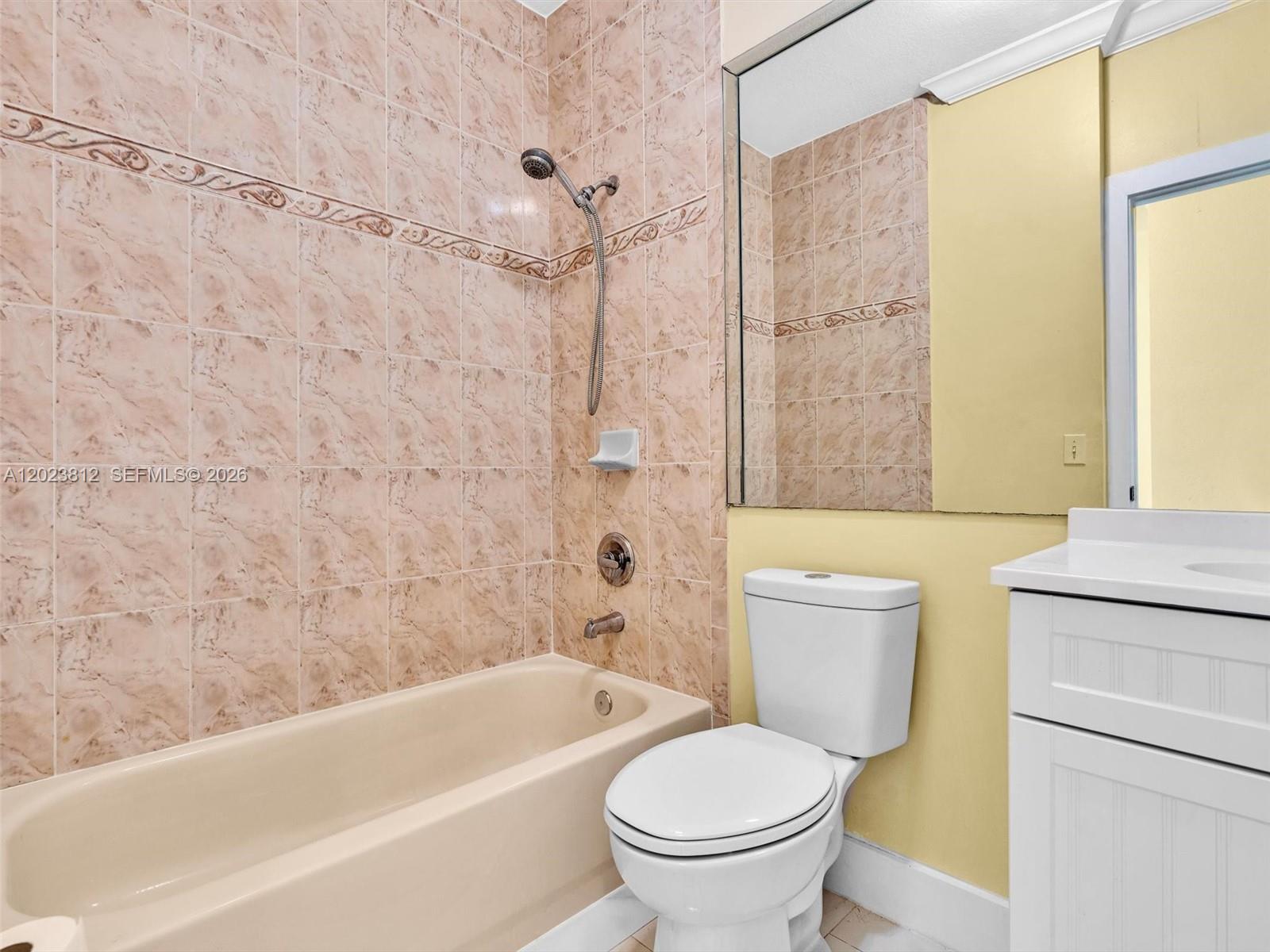 2864 Southwest 138th Path Miami, FL 33175 - Photo 28 of 40 a bathroom with a toilet and a bathtub