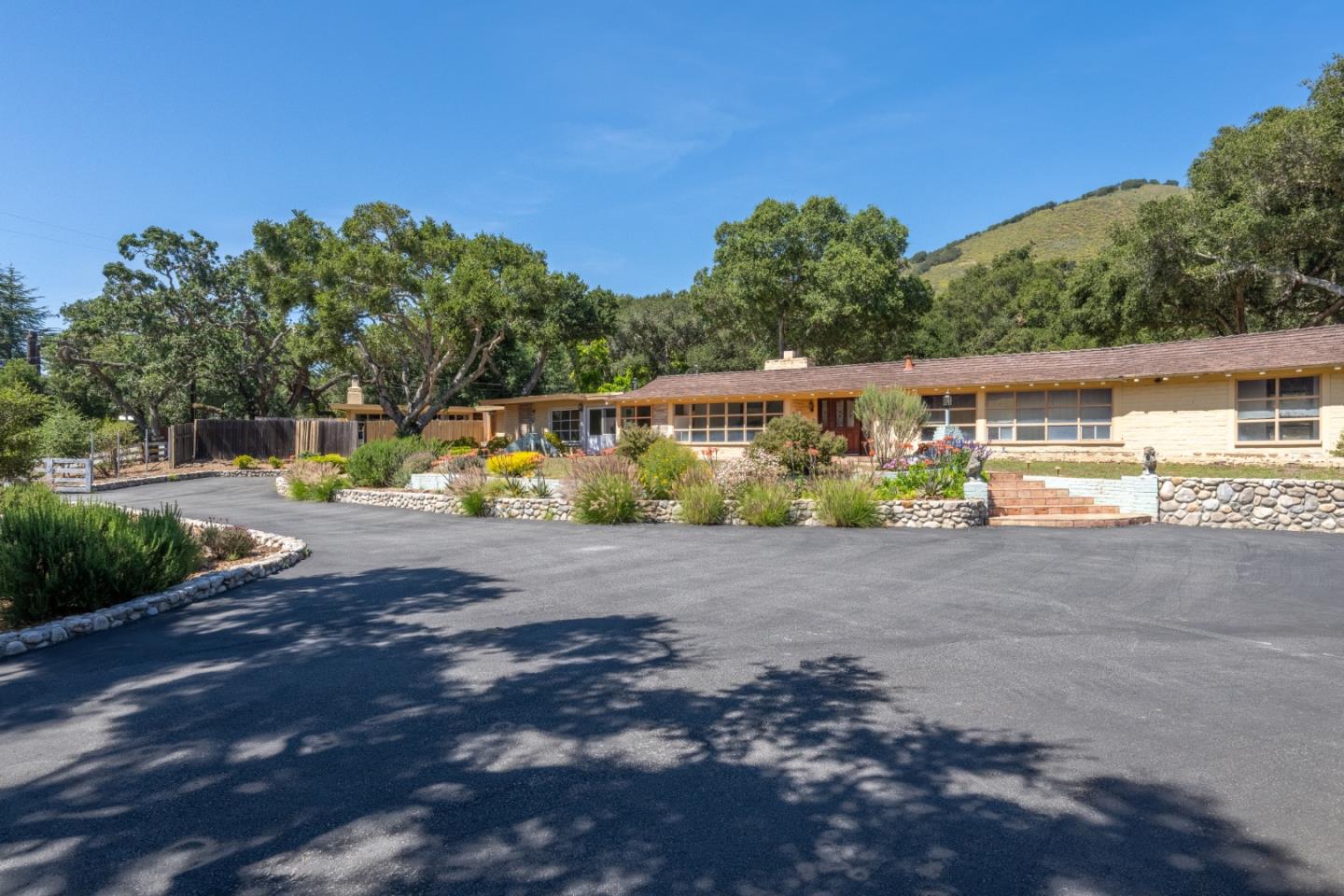 72 Los Laureles Grade Road Carmel Valley, CA 93924 - Photo 29 of 43 a view of a street with a park