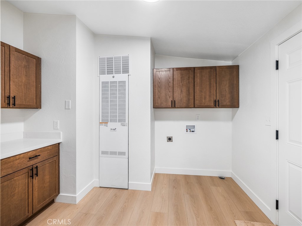 11623 Desert View Road Pinon Hills, CA 92372 - Photo 14 of 47 a view of a kitchen with white cabinets