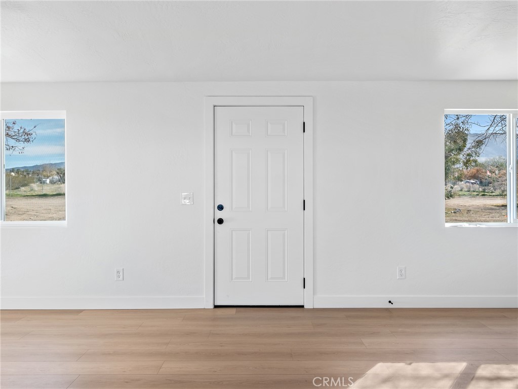 11623 Desert View Road Pinon Hills, CA 92372 - Photo 3 of 47 a view of an empty room