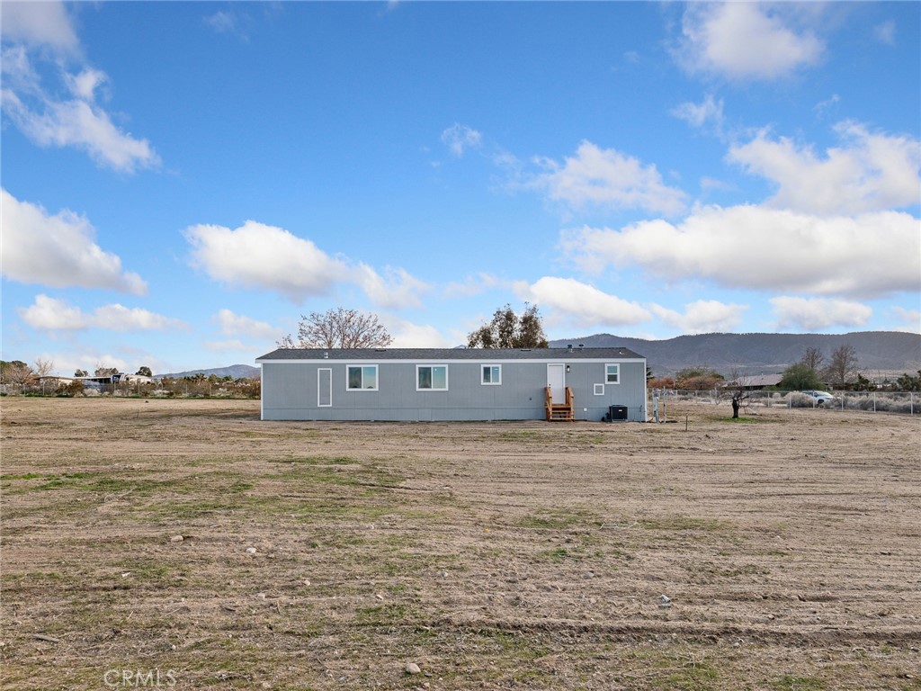 11623 Desert View Road Pinon Hills, CA 92372 - Photo 38 of 47 a view of a lake with a big yard