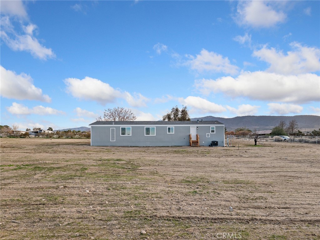 11623 Desert View Road Pinon Hills, CA 92372 - Photo 38 of 47 a view of a lake with a big yard