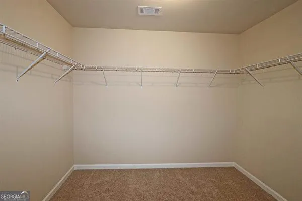 a view of a room with racks on the wall