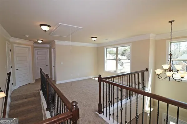 a view of hallway with livingroom