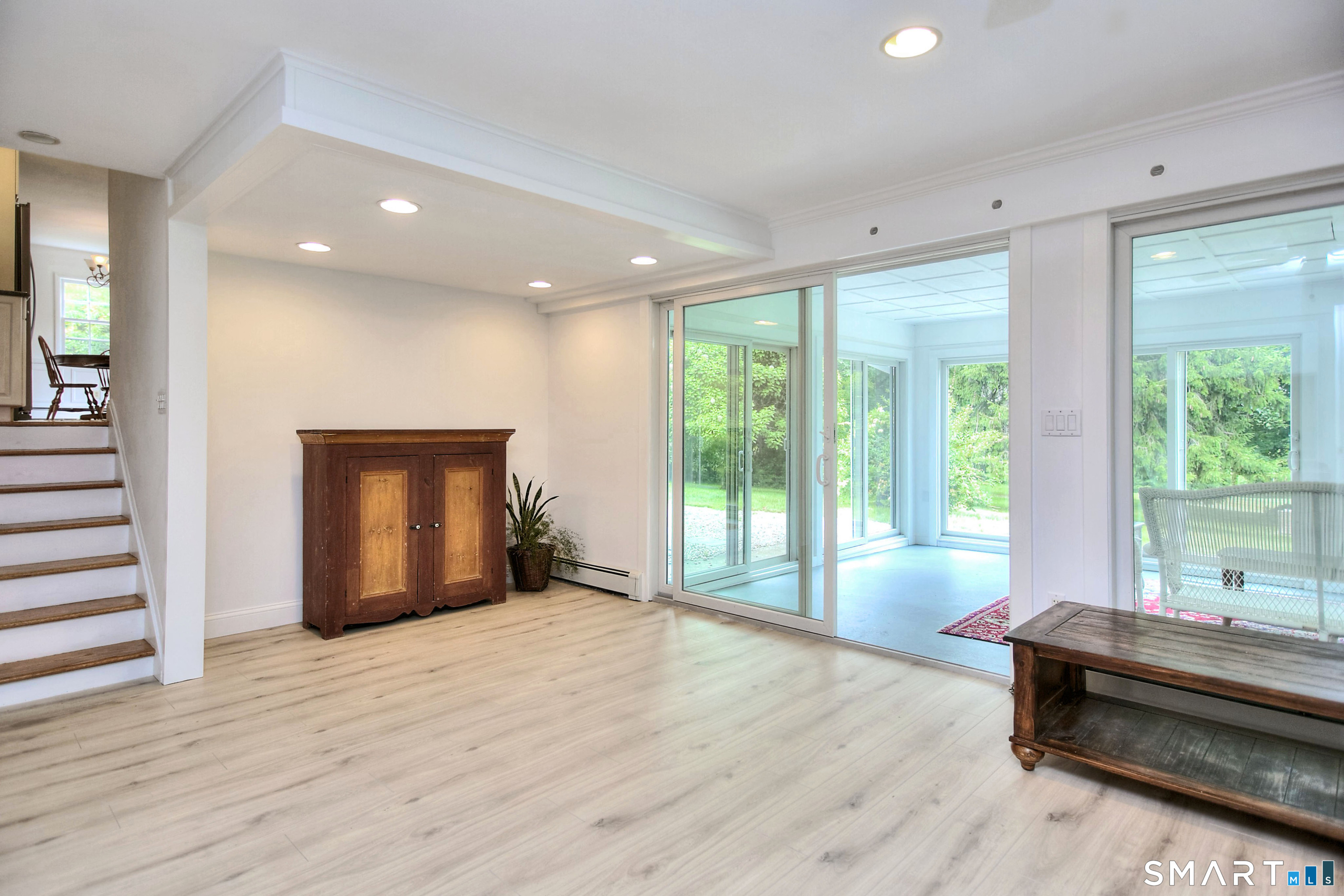324 Ridge Road Orange, CT 06477 - Photo 16 of 38 a view of an empty room with wooden floor and a window