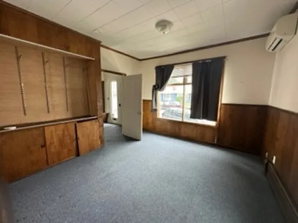 an empty room with windows