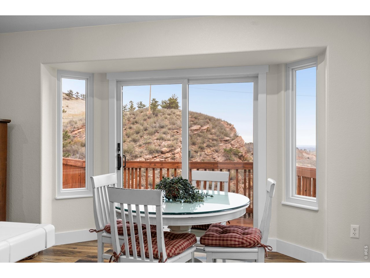 8609 Ranch Road Loveland, CO 80537 - Photo 13 of 44 Roomy Dining Area with Access to Deck