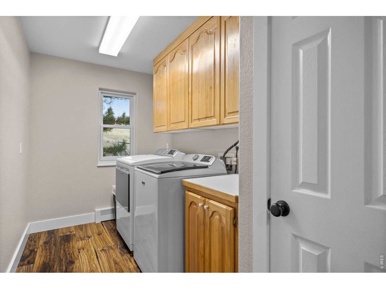 8609 Ranch Road Loveland, CO 80537 - Photo 20 of 44 Laundry Room with Storage