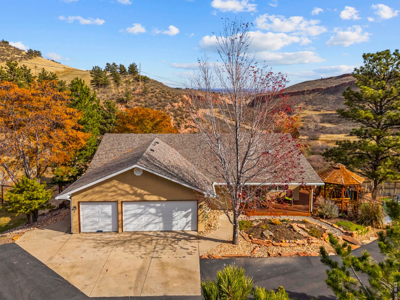 8609 Ranch Road Loveland, CO 80537 - Photo 2 of 44 Covered Front Porch and 3-Car Garage