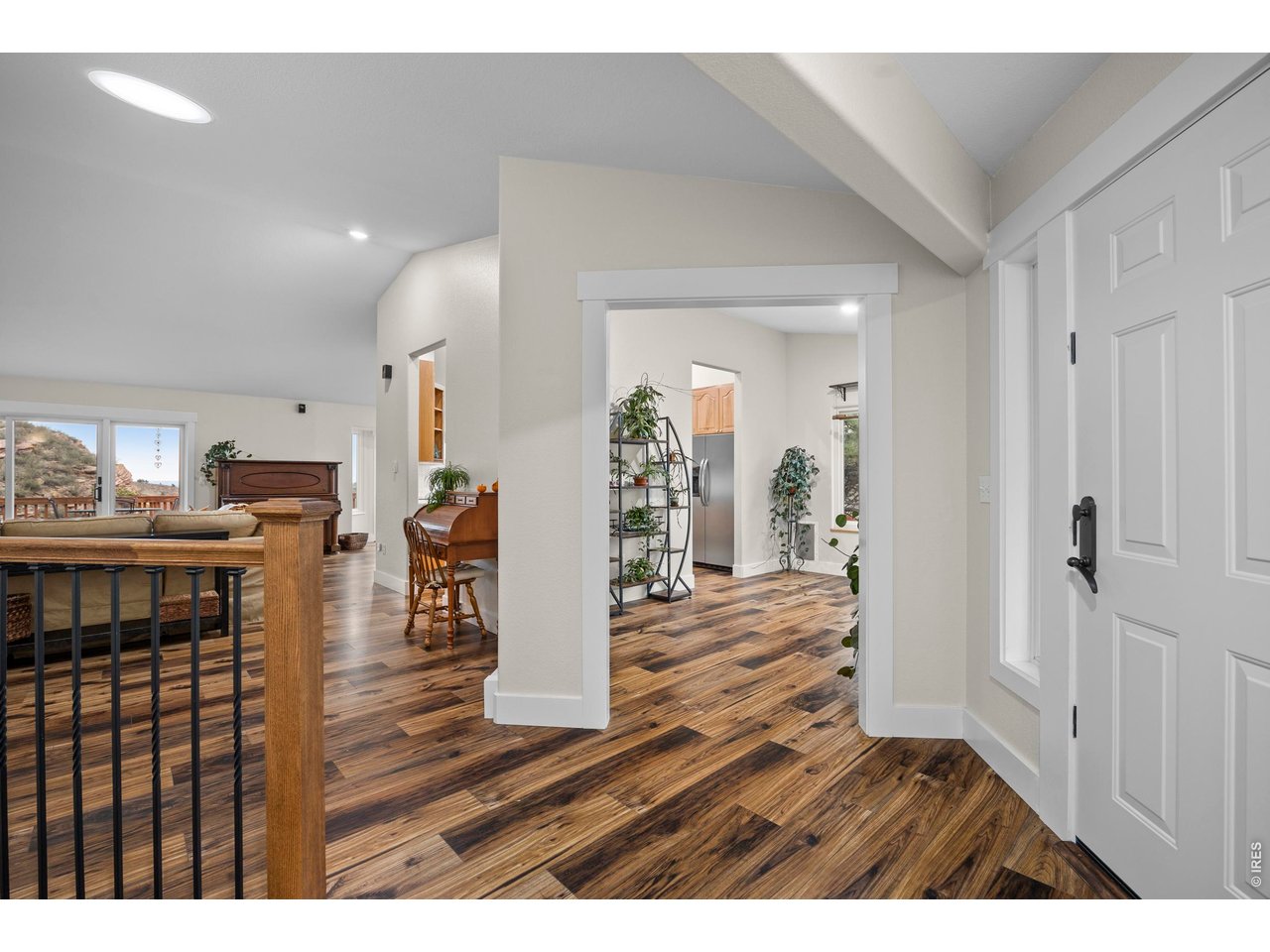 8609 Ranch Road Loveland, CO 80537 - Photo 4 of 44 Foyer with Brand New Luxury Vinyl Plank Flooring Throughout