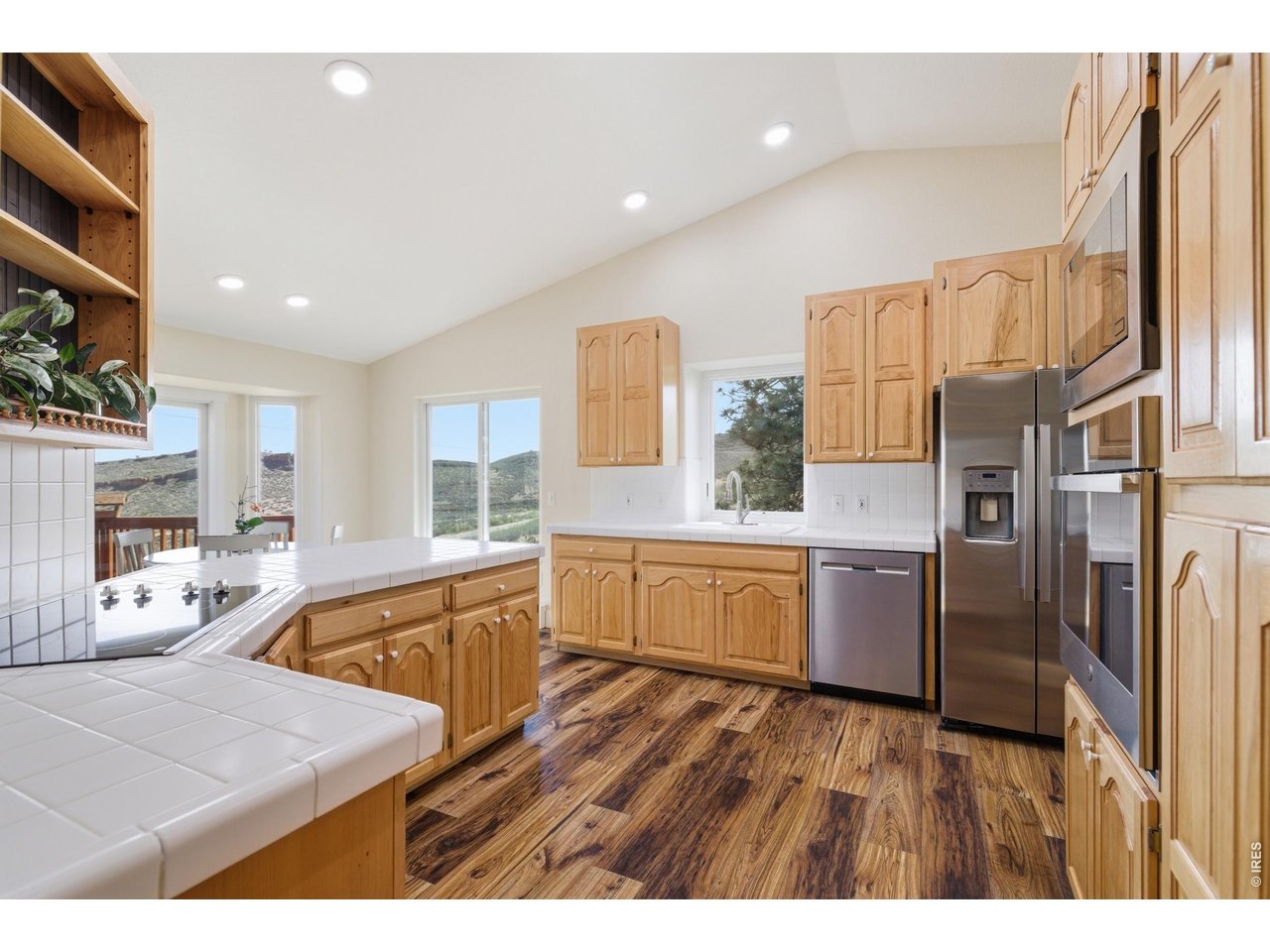 8609 Ranch Road Loveland, CO 80537 - Photo 9 of 44 Large Kitchen with Stainless Steel Appliances