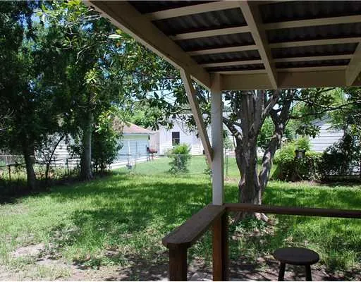 a front view of a house with parking