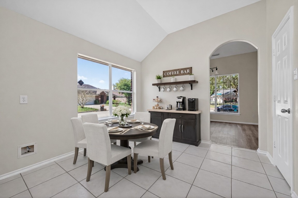 19902 Chaste Tree Lane Humble, TX 77338 - Photo 13 of 43 a dining room with furniture and window