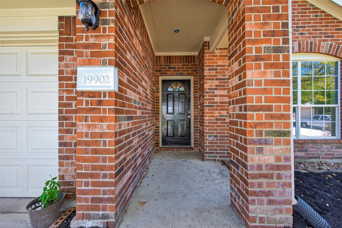 19902 Chaste Tree Lane Humble, TX 77338 - Photo 4 of 43 a front view of a building