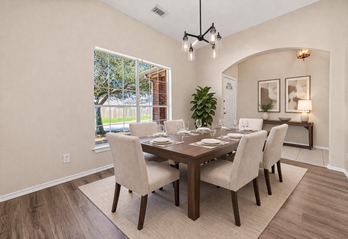 19902 Chaste Tree Lane Humble, TX 77338 - Photo 6 of 43 a view of a dining room with furniture window and wooden floor