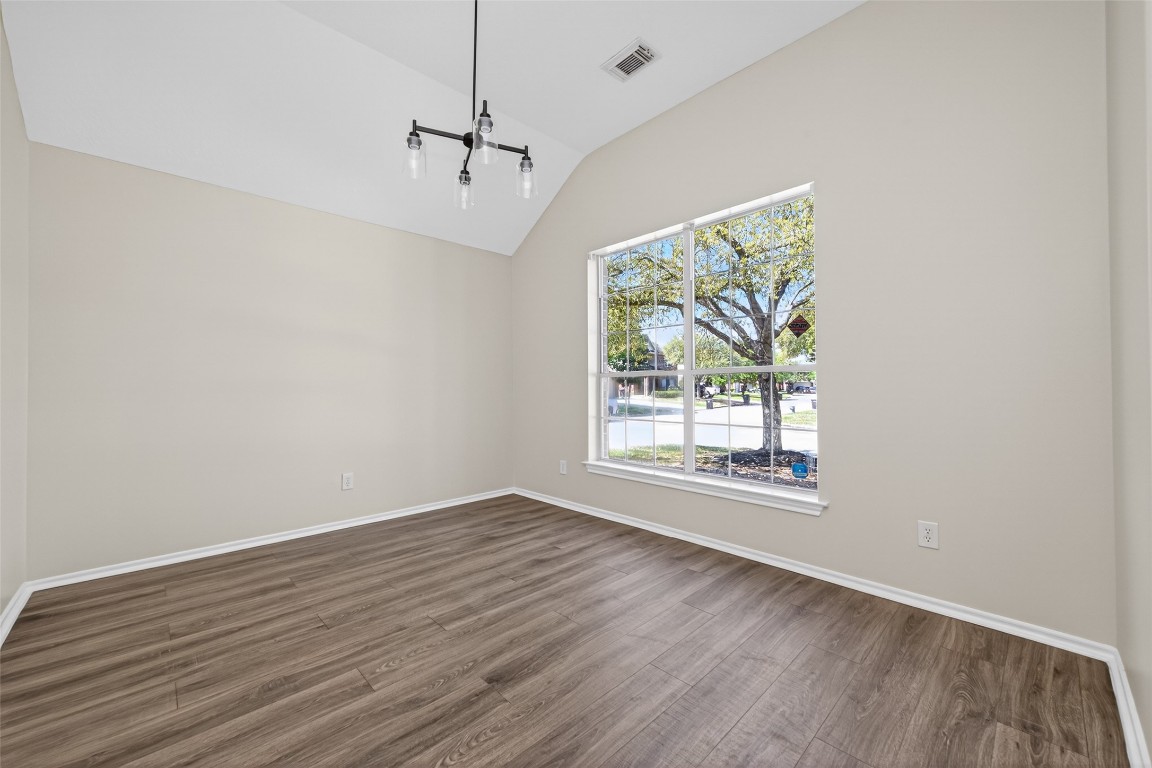 19902 Chaste Tree Lane Humble, TX 77338 - Photo 8 of 43 wooden floor in an empty room with a window