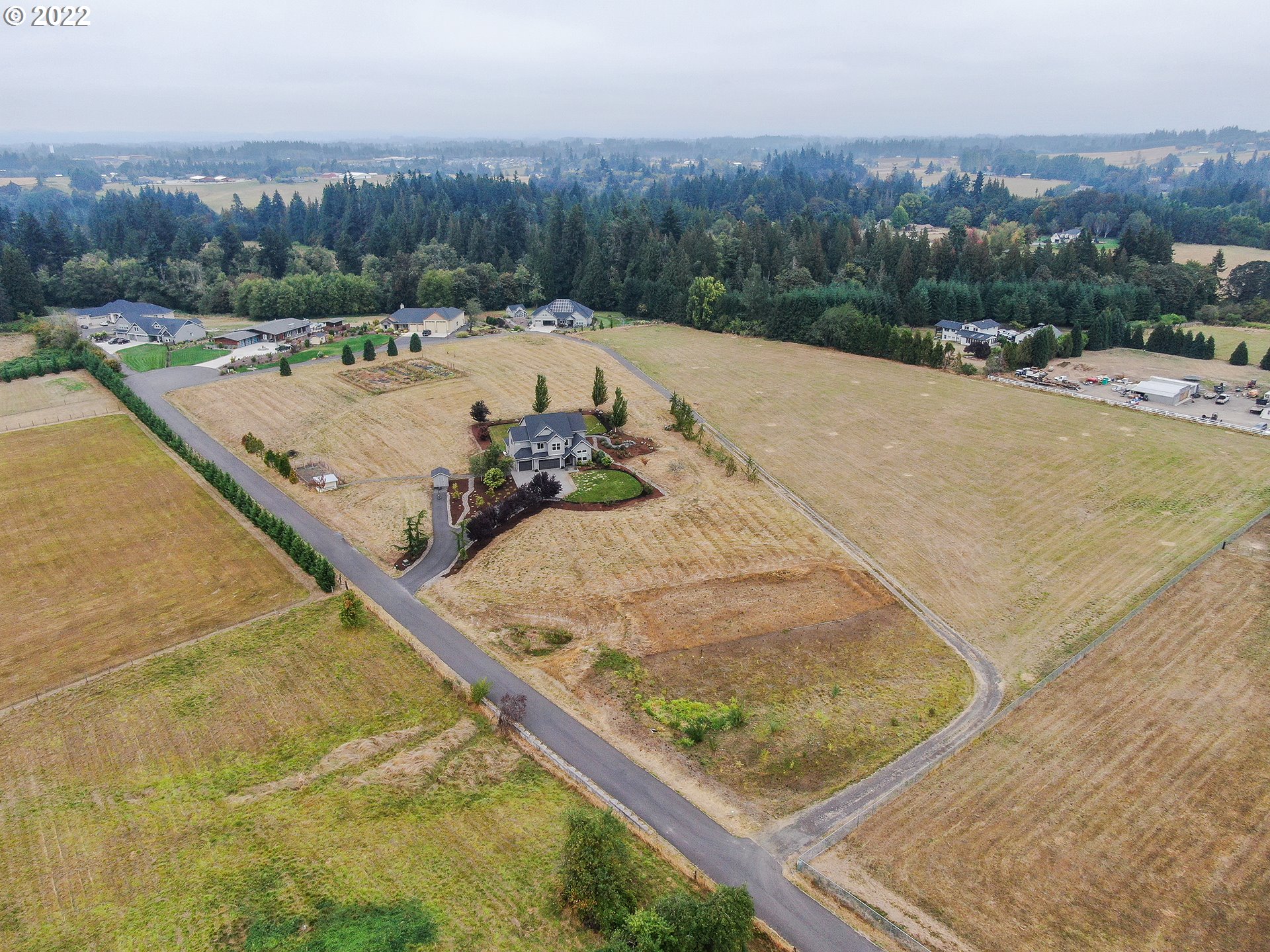 4820 Northwest 209th Street Ridgefield, WA 98642 - Photo 28 of 28 a view of a swimming pool with a yard