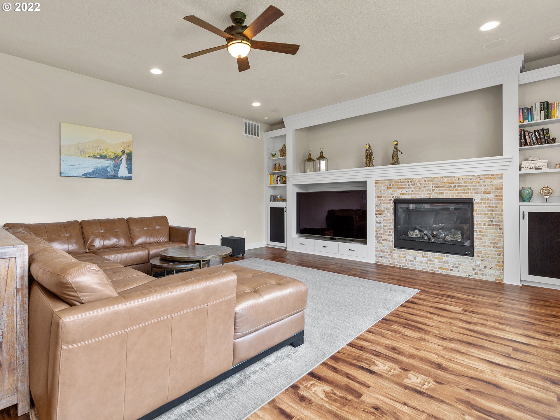 4820 Northwest 209th Street Ridgefield, WA 98642 - Photo 4 of 28 a living room with furniture and a fireplace