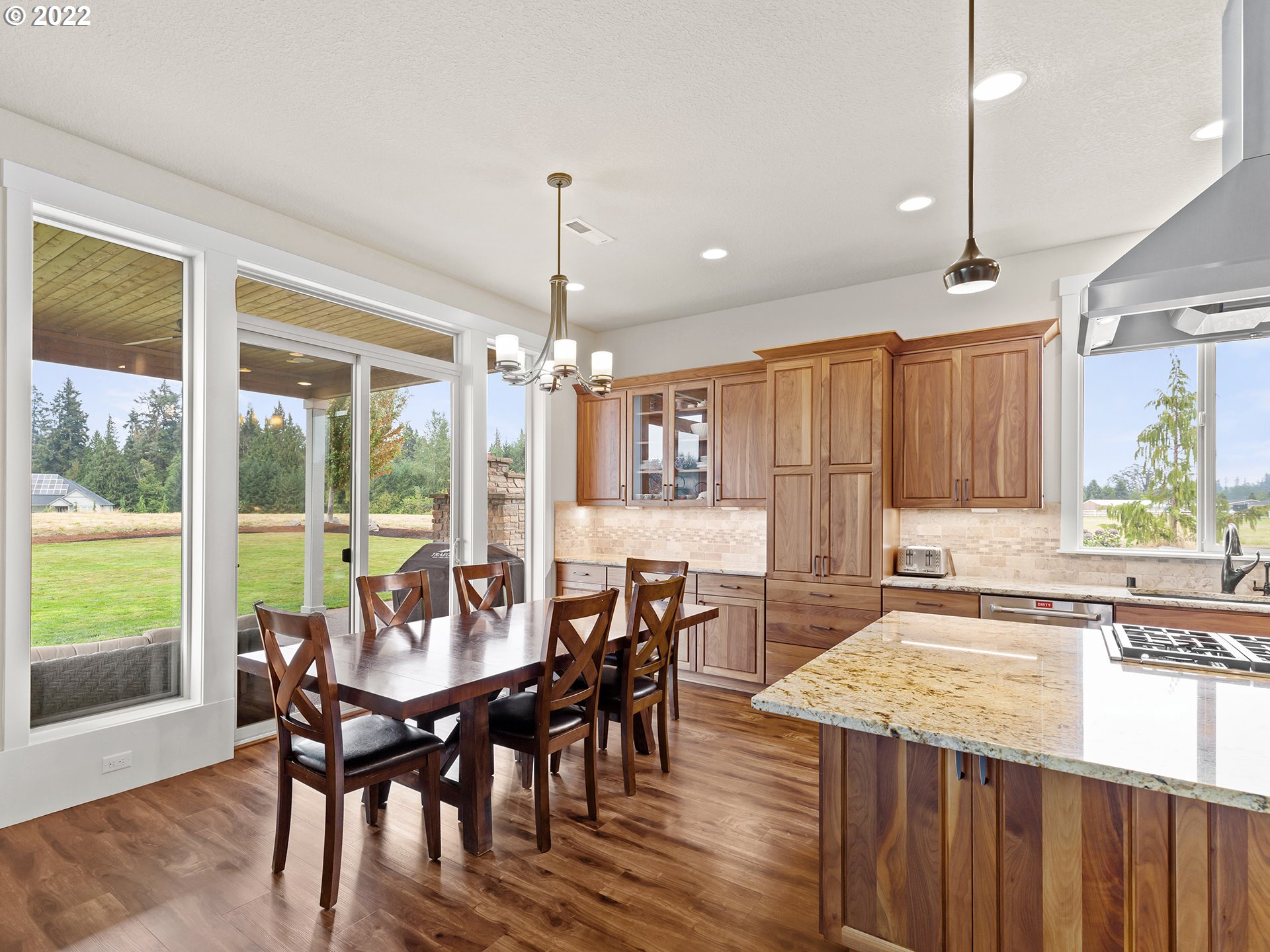 4820 Northwest 209th Street Ridgefield, WA 98642 - Photo 8 of 28 a view of a dining room with furniture window and outside view