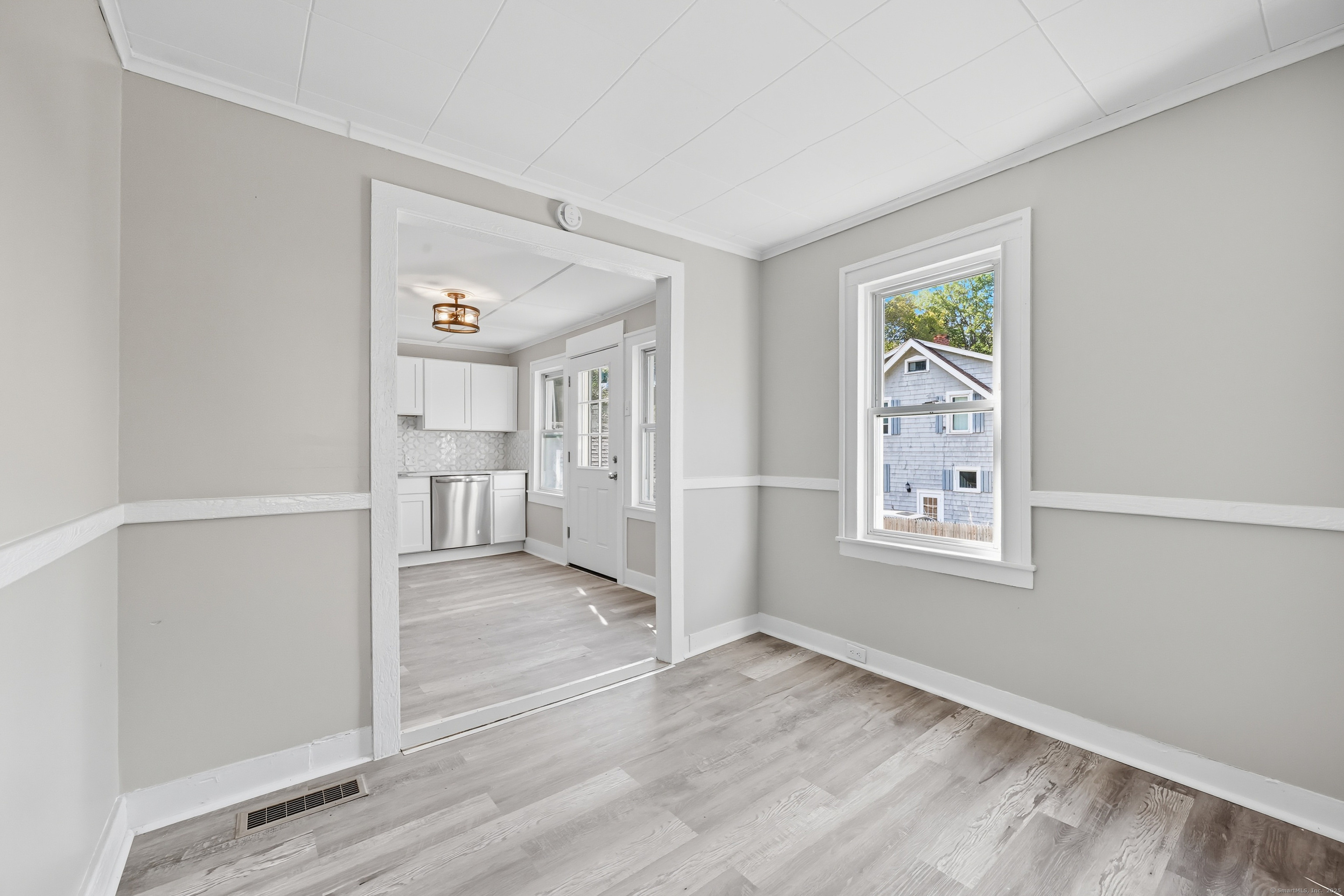 785 Main Street Plymouth, CT 06782 - Photo 11 of 30 an empty room with windows and closet