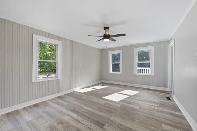 a view of an empty room and window