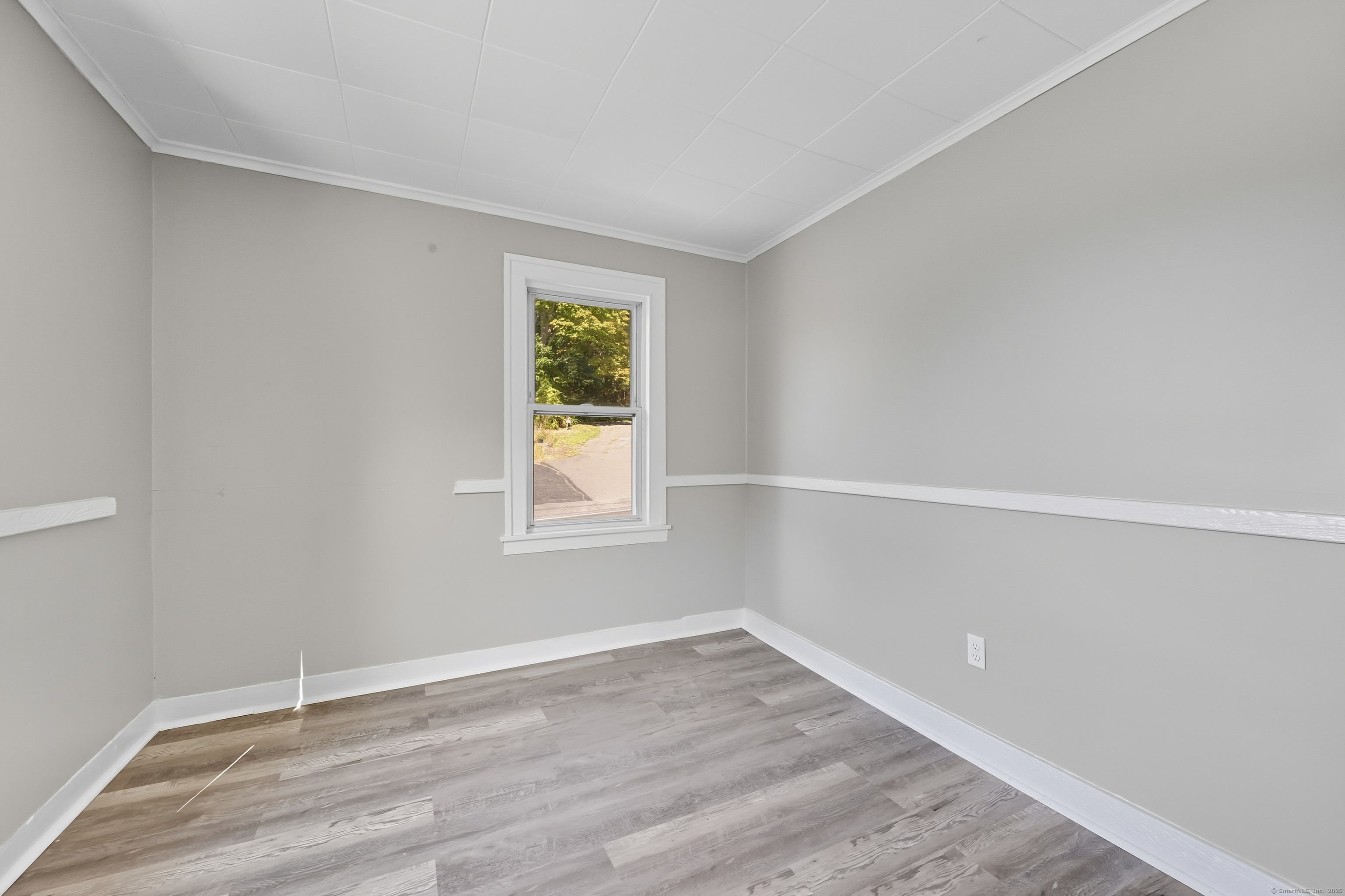 785 Main Street Plymouth, CT 06782 - Photo 15 of 30 an empty room with a window