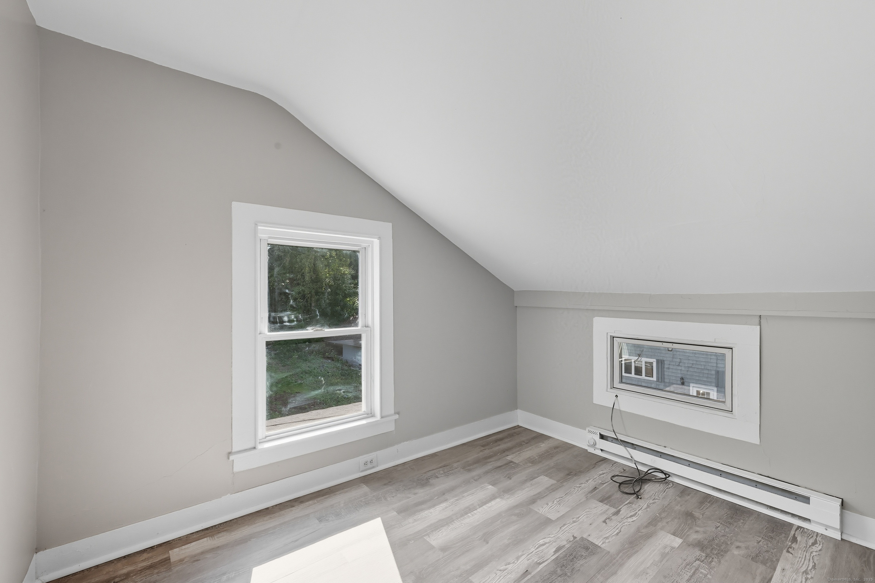 785 Main Street Plymouth, CT 06782 - Photo 17 of 30 a view of an empty room with a window