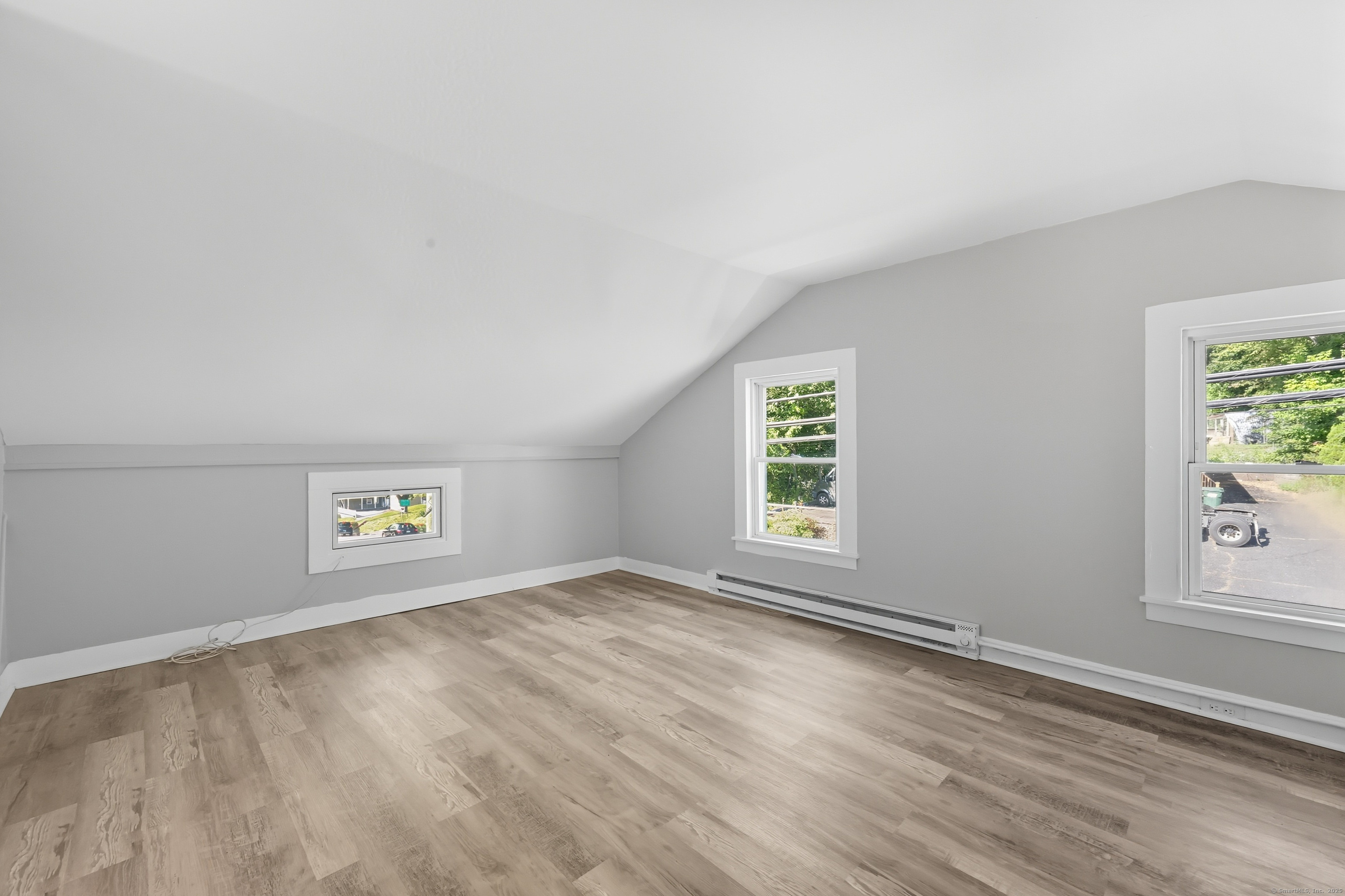 785 Main Street Plymouth, CT 06782 - Photo 19 of 30 an empty room with windows