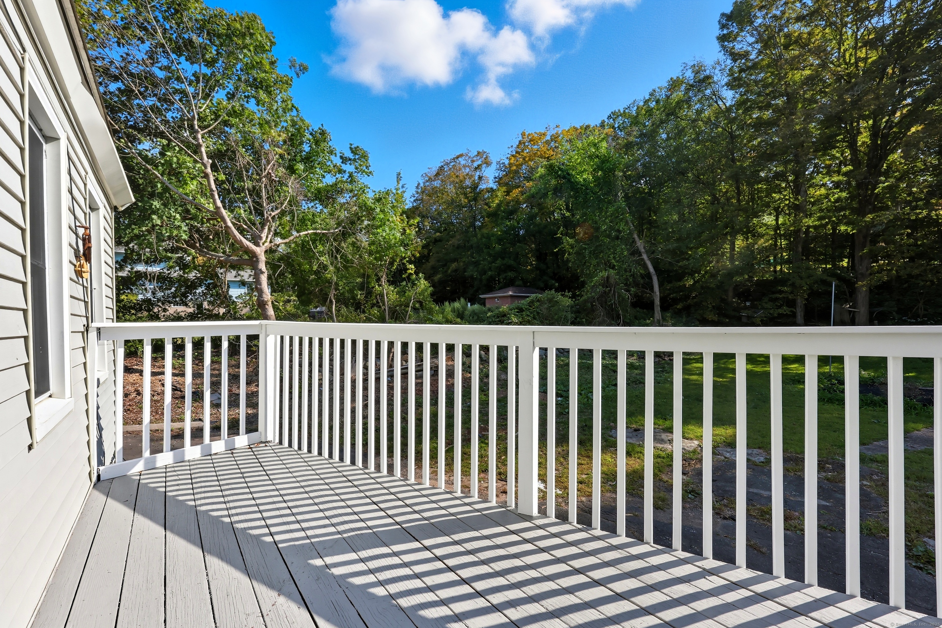 785 Main Street Plymouth, CT 06782 - Photo 3 of 30 a view of a wooden roof deck