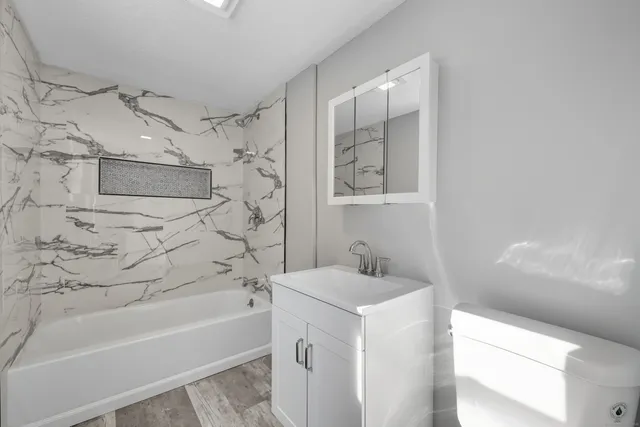 a bathroom with a sink and a bathtub