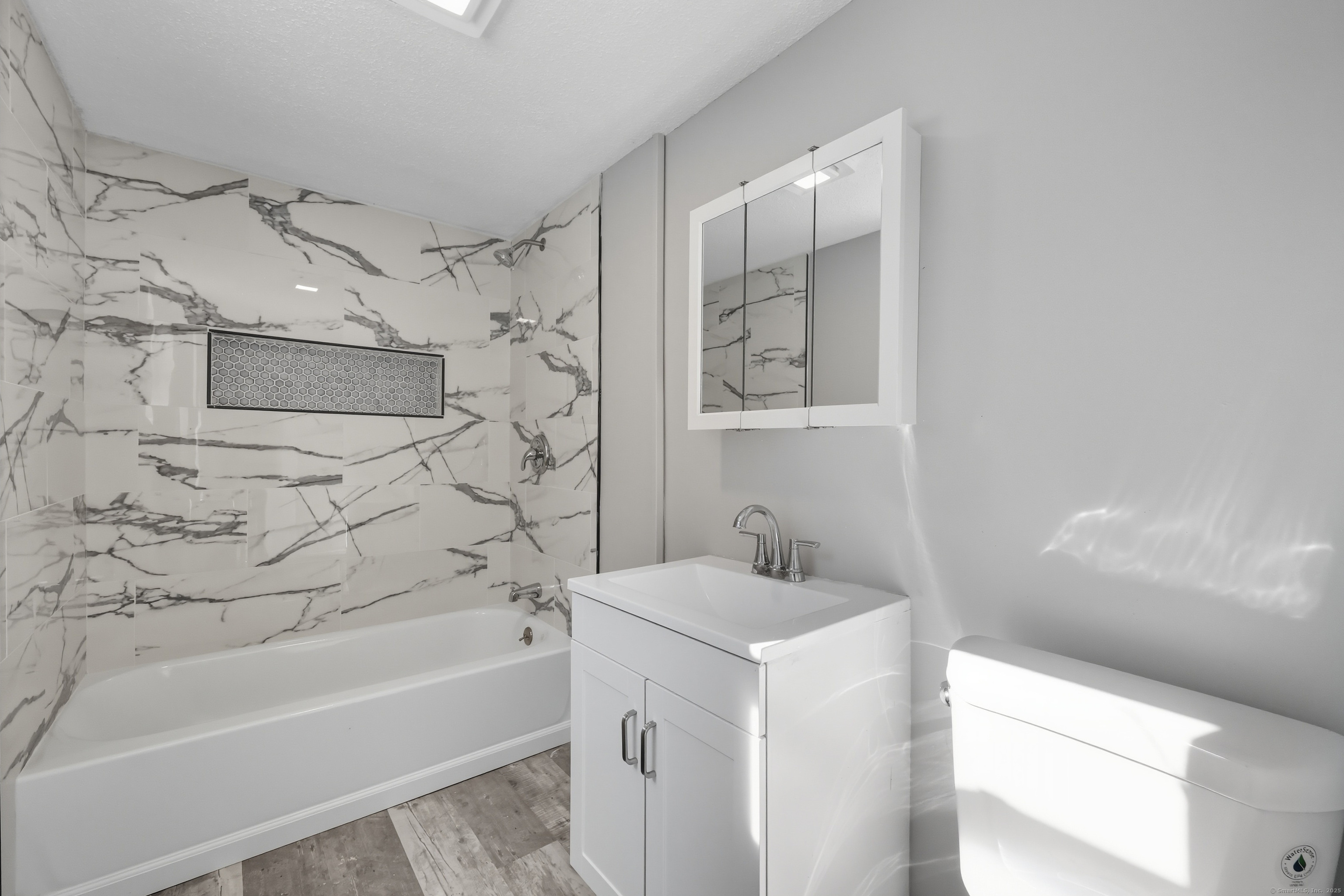 785 Main Street Plymouth, CT 06782 - Photo 8 of 30 a bathroom with a sink and a bathtub