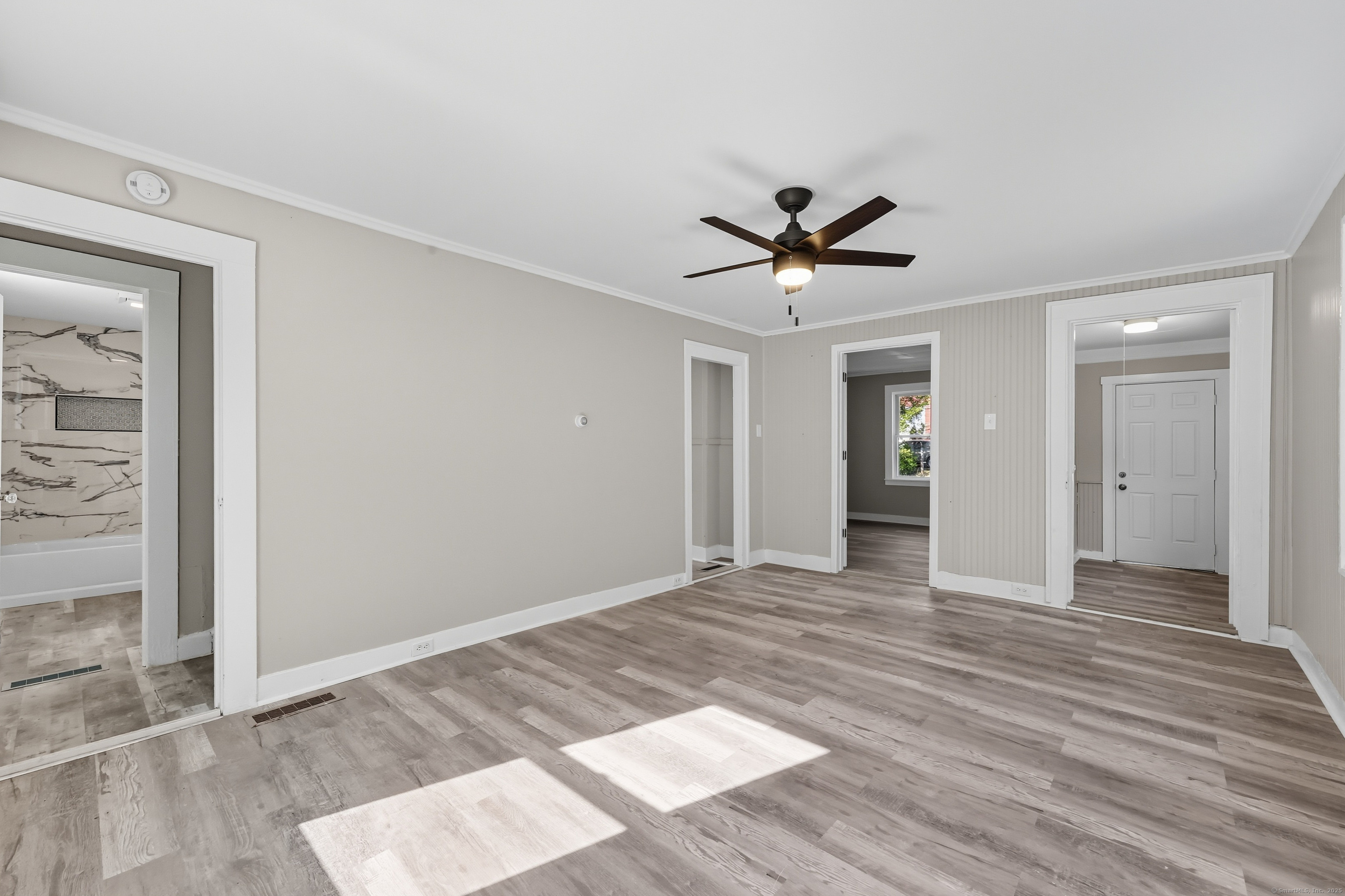 785 Main Street Plymouth, CT 06782 - Photo 10 of 30 wooden floor in an empty room with a window