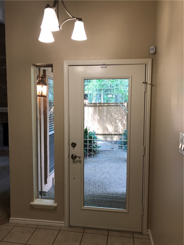 7922 Ridgeline North Austin, TX 78759 - Photo 10 of 31 Front entry opening onto the private courtyard.