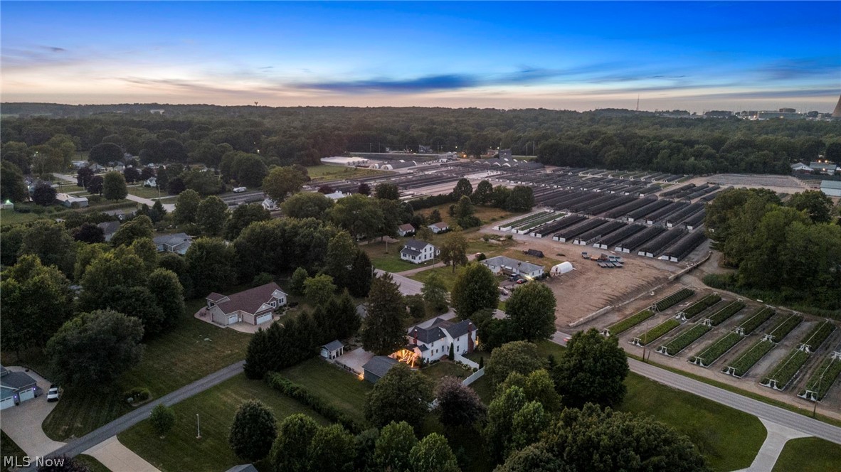 4122 Middle Ridge Road Perry, OH 44081 - Photo 47 of 50 Expansive aerial capturing residential properties amidst abundant mature trees