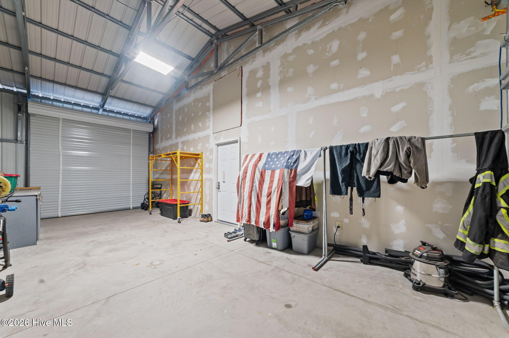 4176 Jolly Road Ayden, NC 28513 - Photo 36 of 51 attached garage with tall roll up door