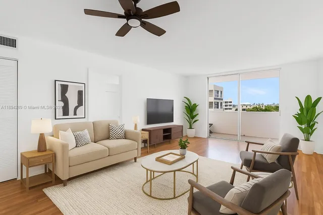 a living room with furniture and a couch