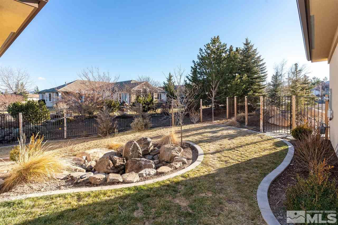 4920 Gila Bend Road Reno, NV 89511 - Photo 18 of 23 a view of a swimming pool with a house