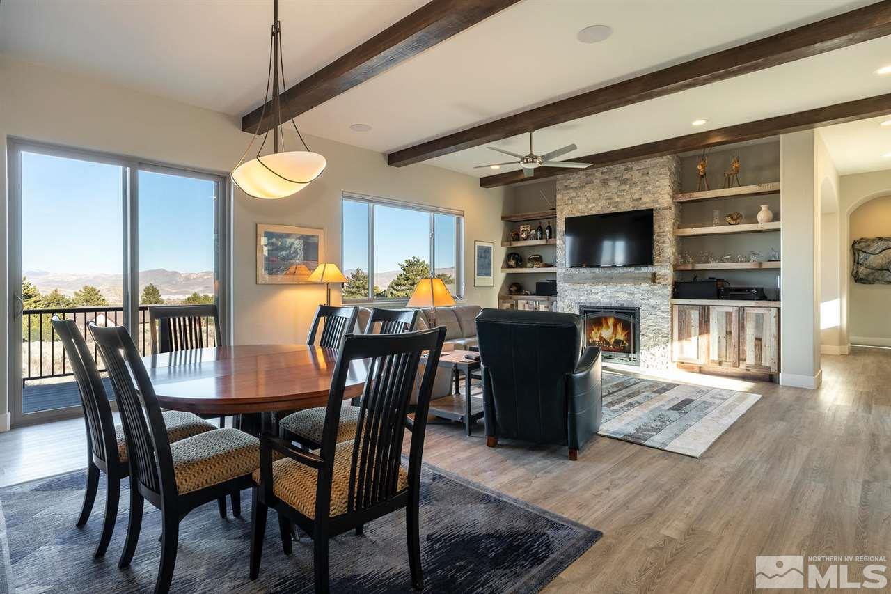 4920 Gila Bend Road Reno, NV 89511 - Photo 4 of 23 a view of a dining room with furniture window and wooden floor