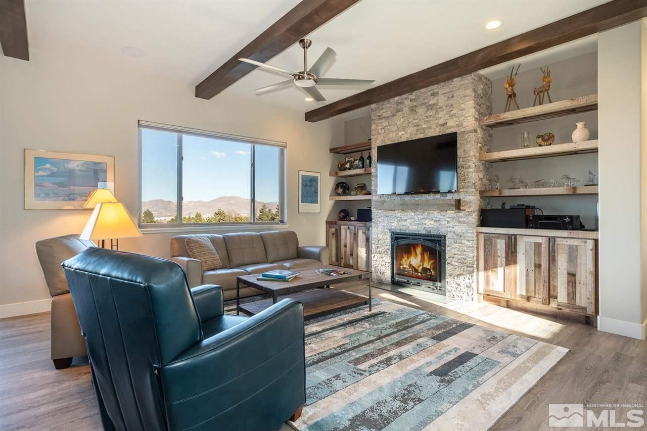 4920 Gila Bend Road Reno, NV 89511 - Photo 5 of 23 a living room with furniture and a fireplace