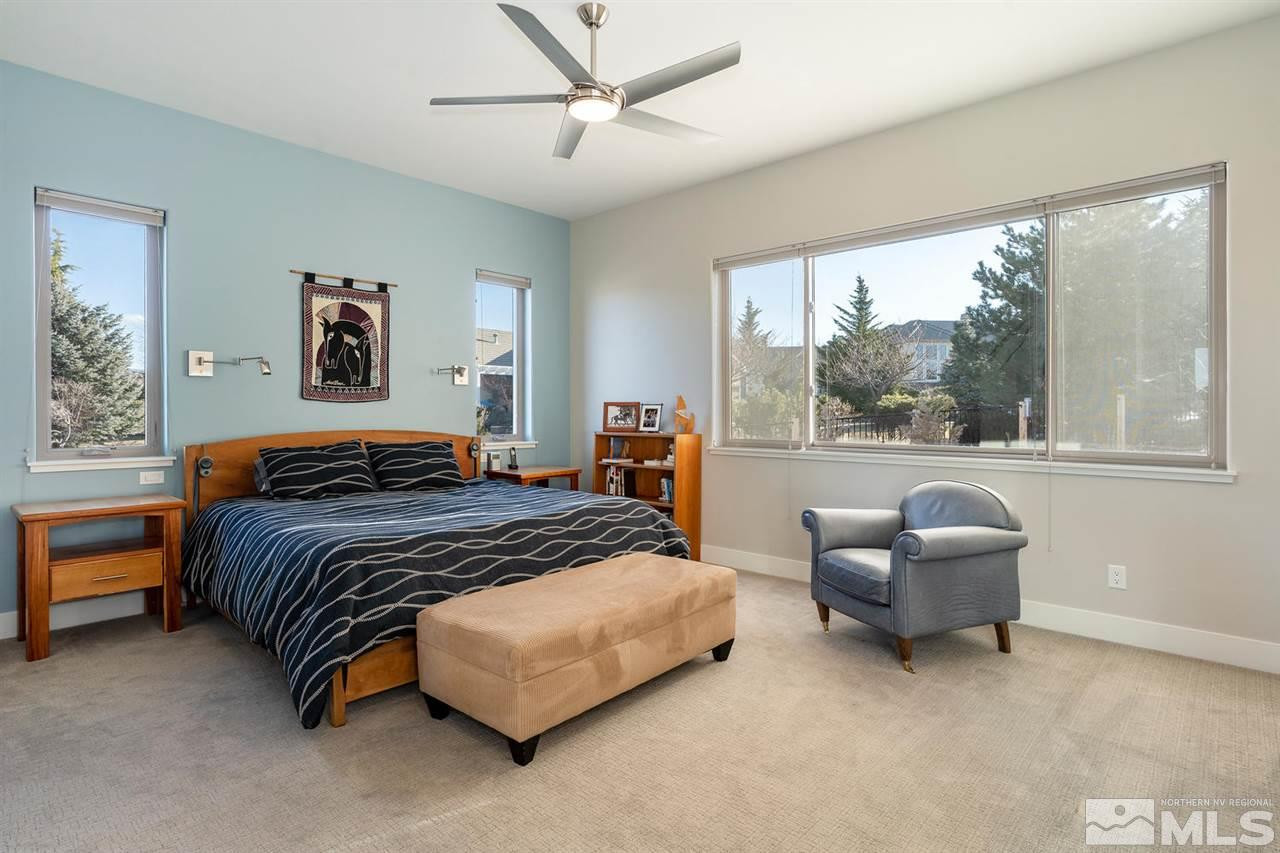 4920 Gila Bend Road Reno, NV 89511 - Photo 9 of 23 a bedroom with a bed and a large window