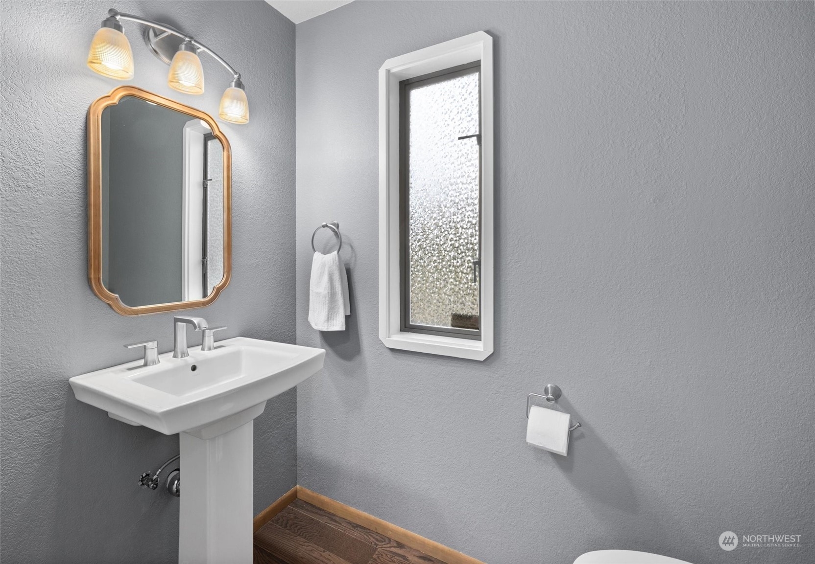 20622 37th Avenue Southeast Bothell, WA 98021 - Photo 15 of 38 a bathroom with a toilet sink and mirror