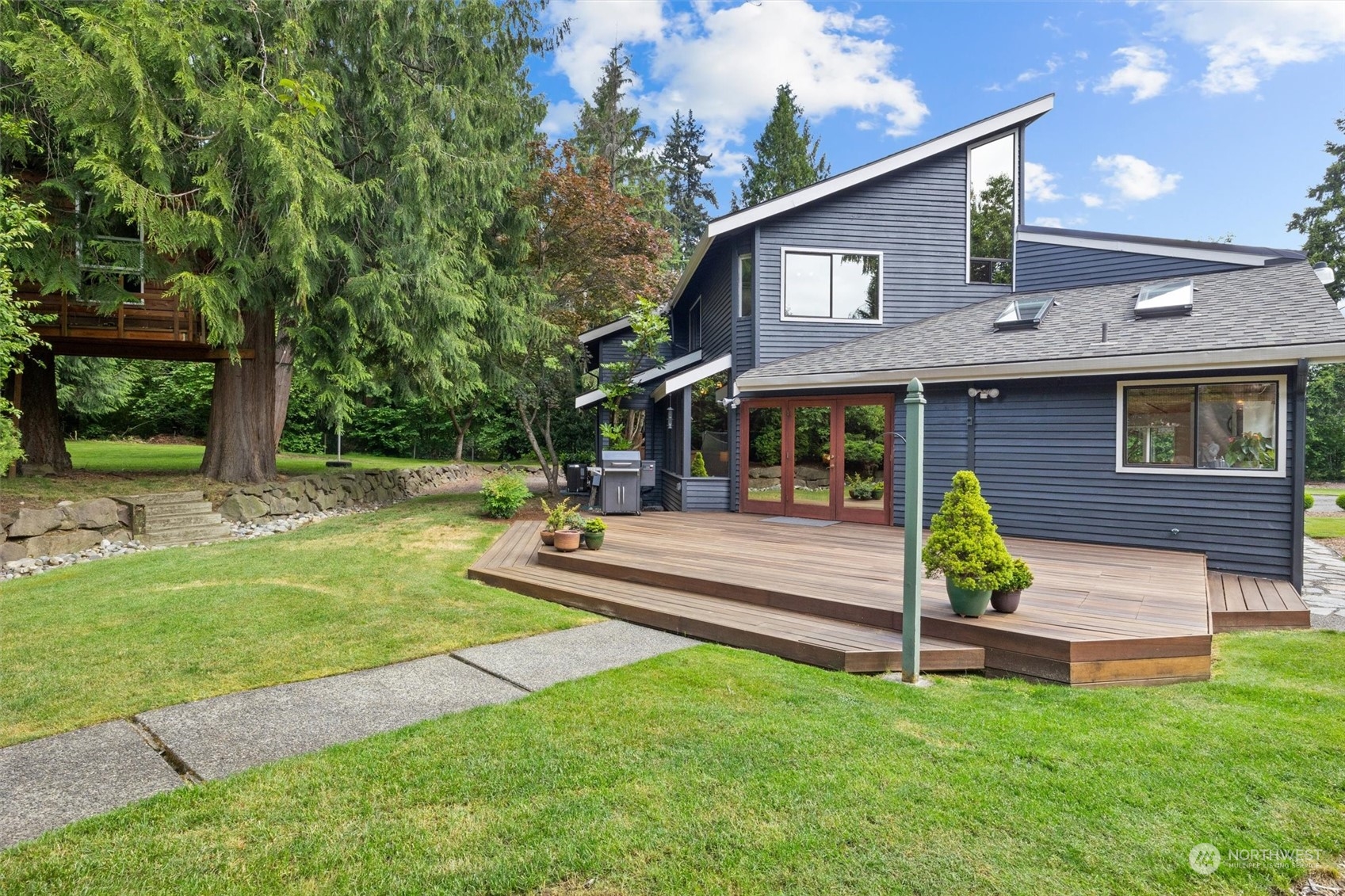 20622 37th Avenue Southeast Bothell, WA 98021 - Photo 26 of 38 a view of a house with a yard