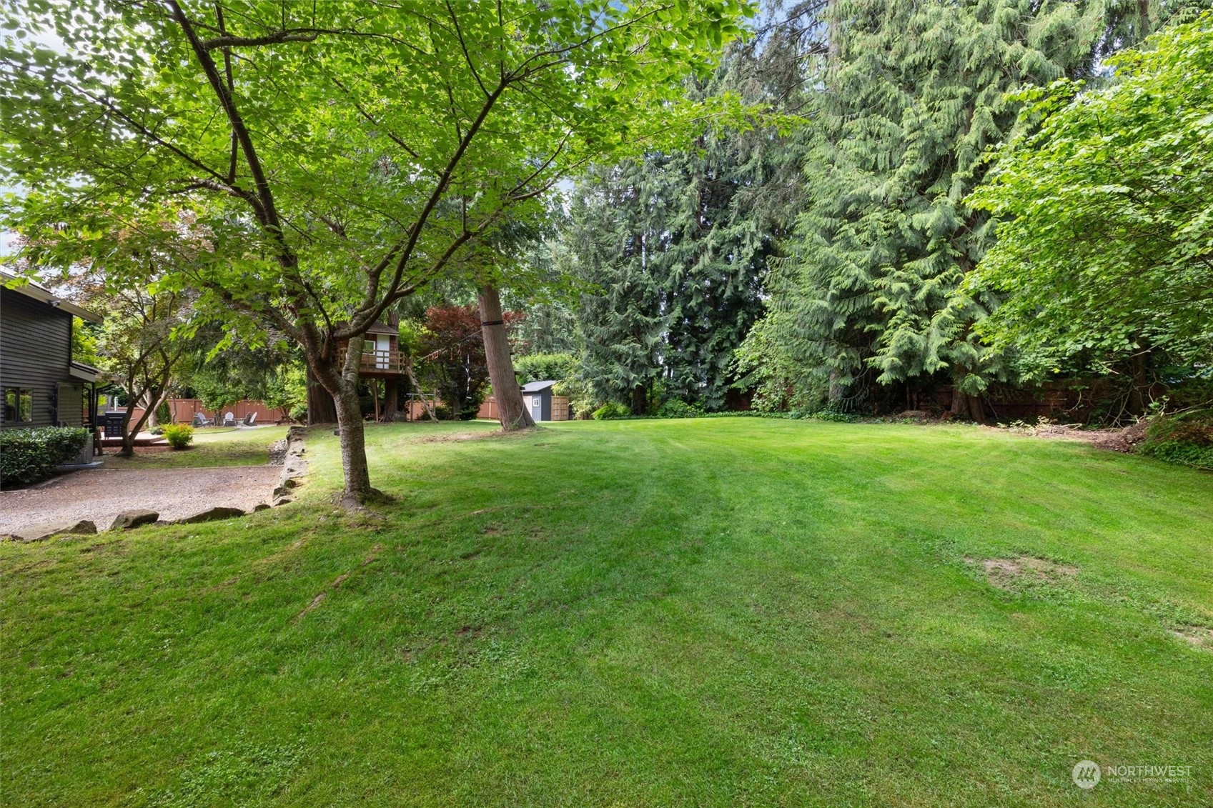 20622 37th Avenue Southeast Bothell, WA 98021 - Photo 27 of 38 a view of green field with trees
