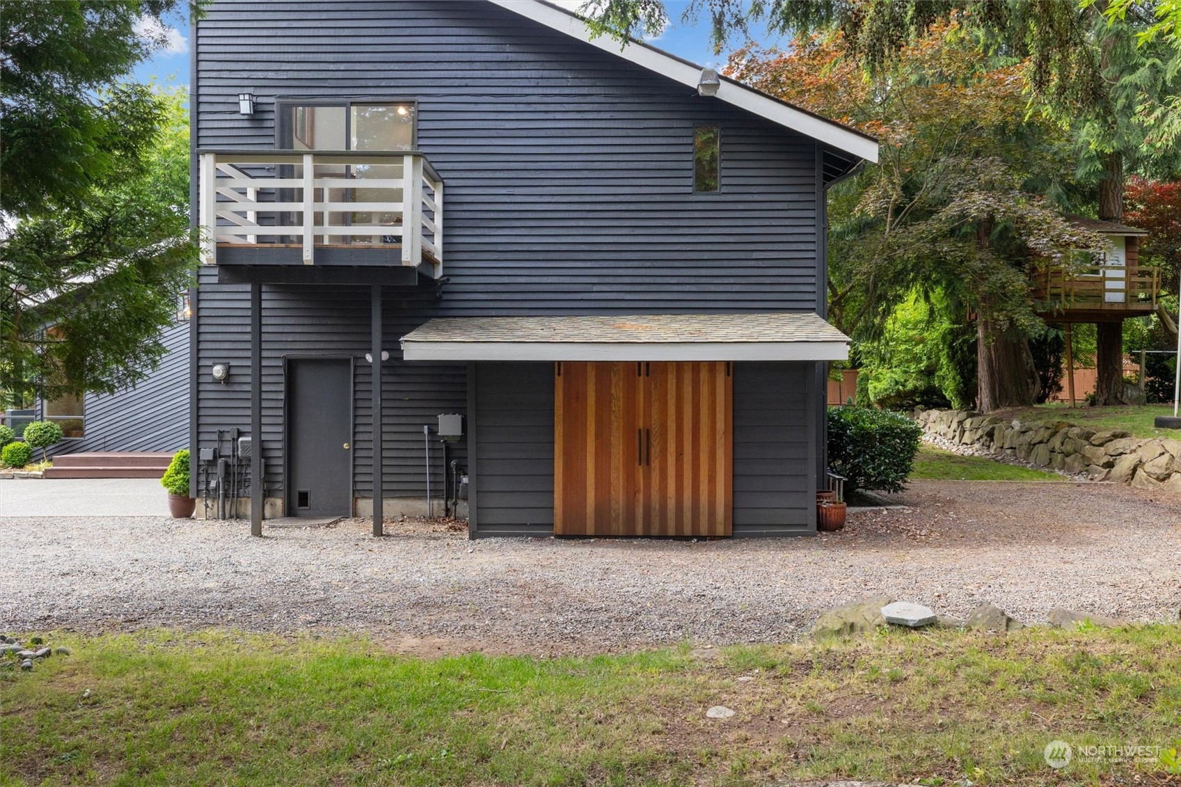 20622 37th Avenue Southeast Bothell, WA 98021 - Photo 28 of 38 a front view of a house with a yard and garage