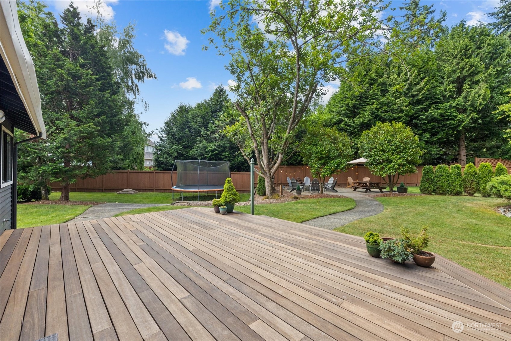 20622 37th Avenue Southeast Bothell, WA 98021 - Photo 31 of 38 a view of a house with backyard and a garden