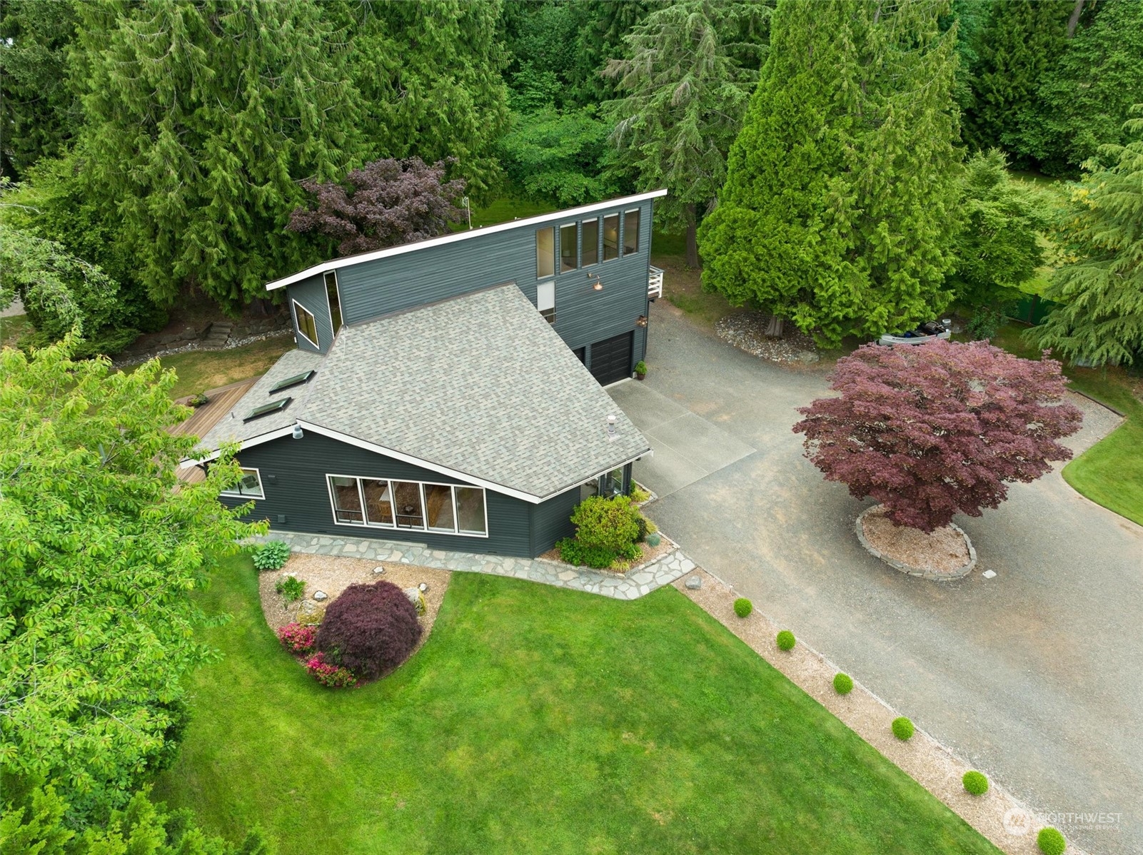 20622 37th Avenue Southeast Bothell, WA 98021 - Photo 37 of 38 a view of a house with a yard and sitting area
