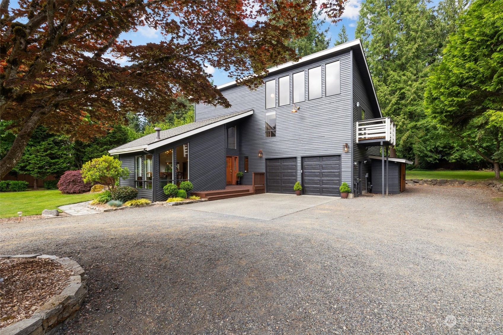 20622 37th Avenue Southeast Bothell, WA 98021 - Photo 4 of 38 a view of a house with a yard and garage
