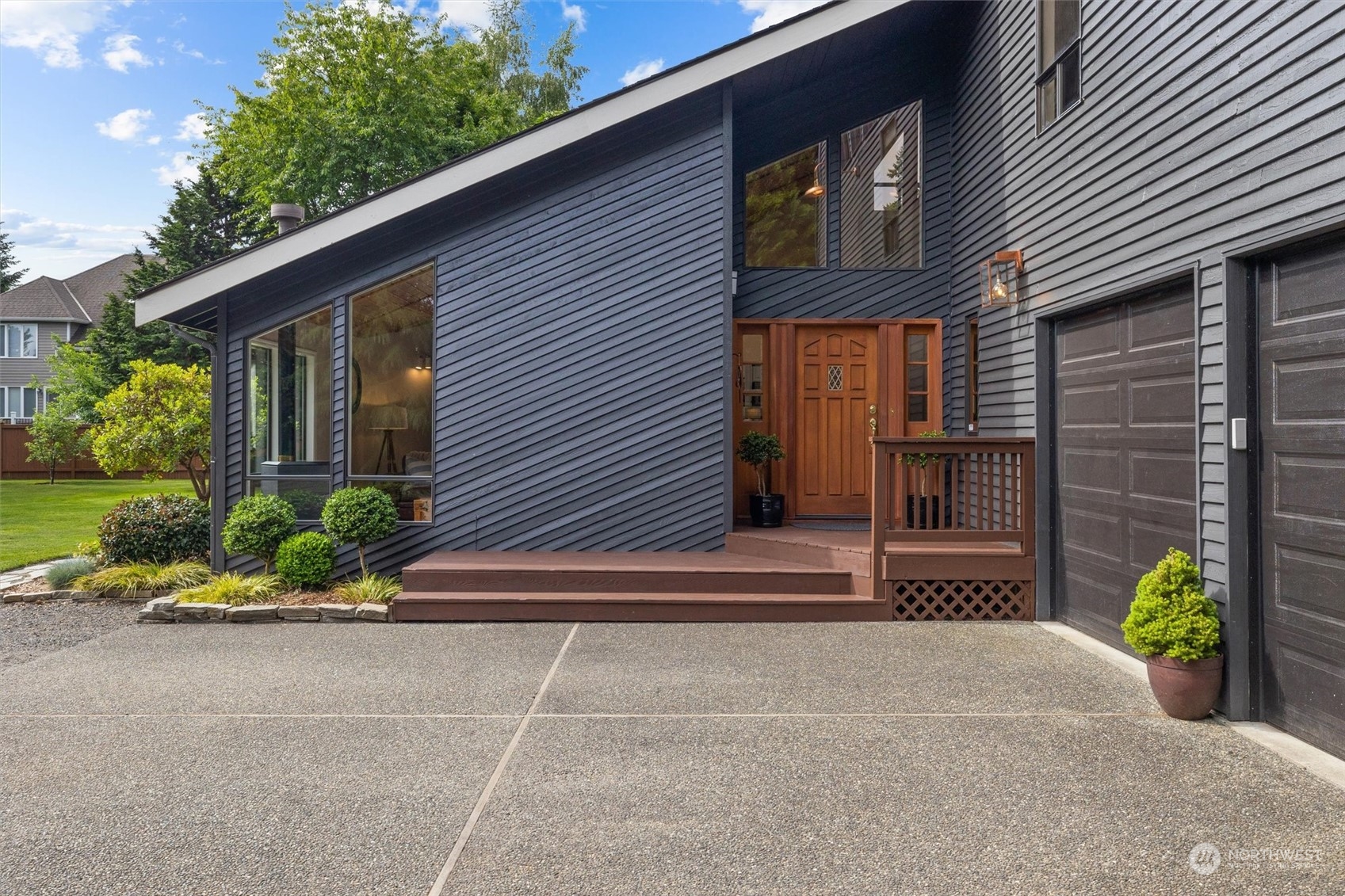20622 37th Avenue Southeast Bothell, WA 98021 - Photo 5 of 38 a front view of a house with a yard